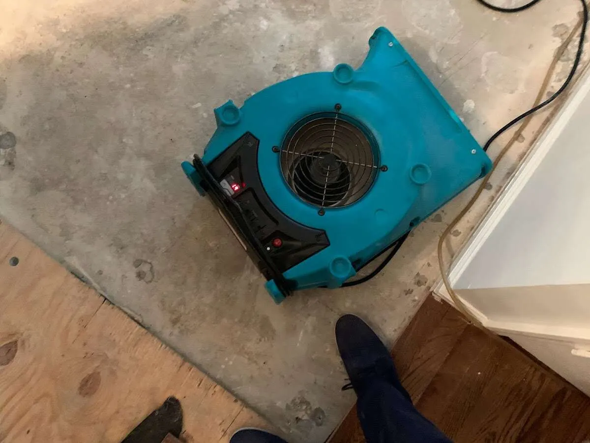 Air mover drying subfloor during Leak Detection & Repair in Escondido